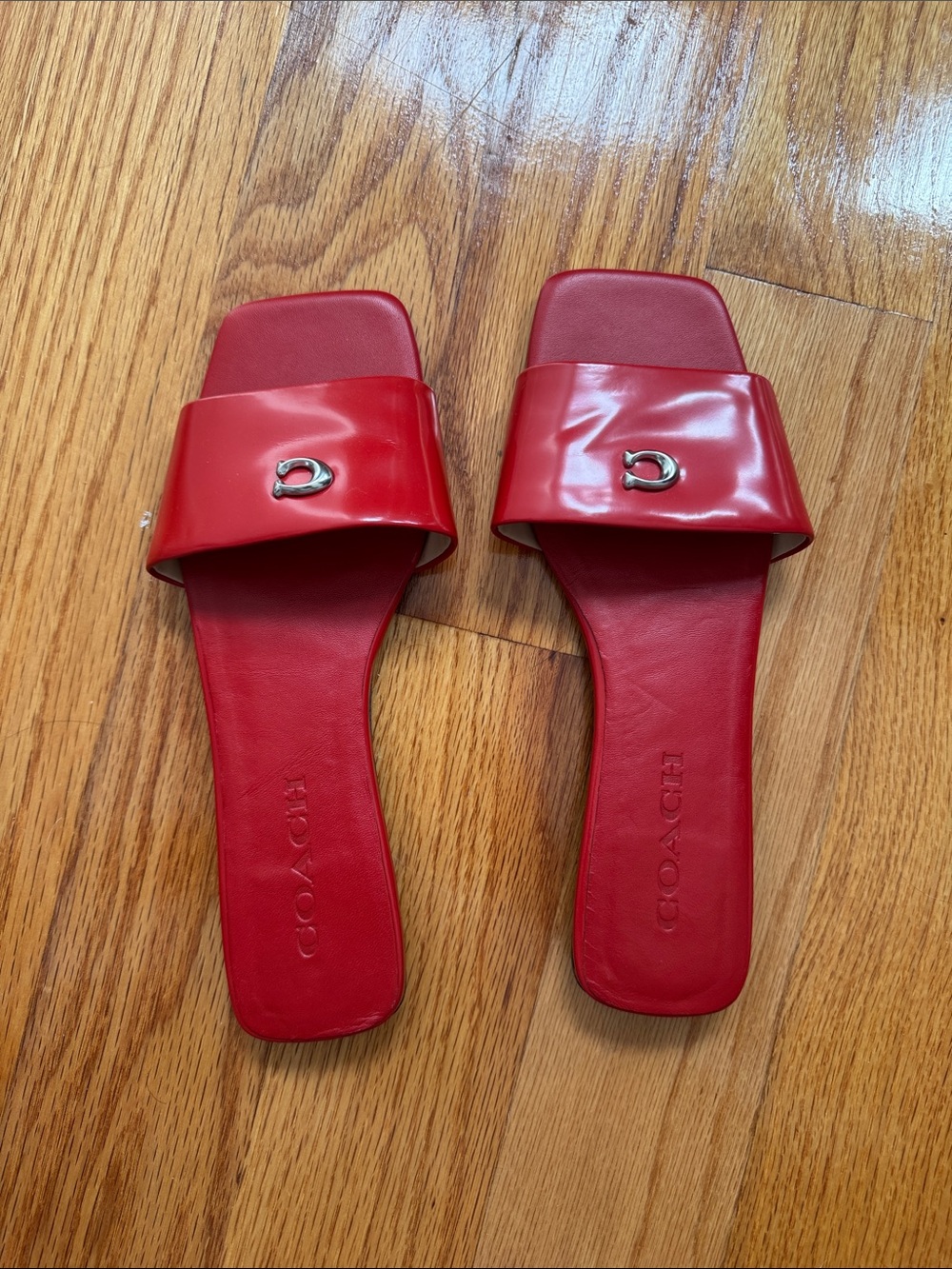 Coach Red Slide Sandals with Silver 'C' Accent